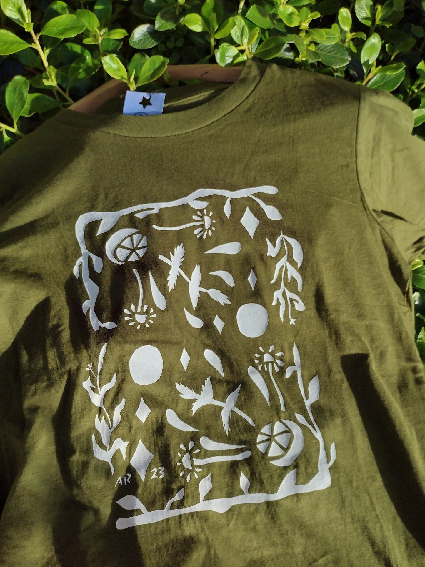 The Roots Tee